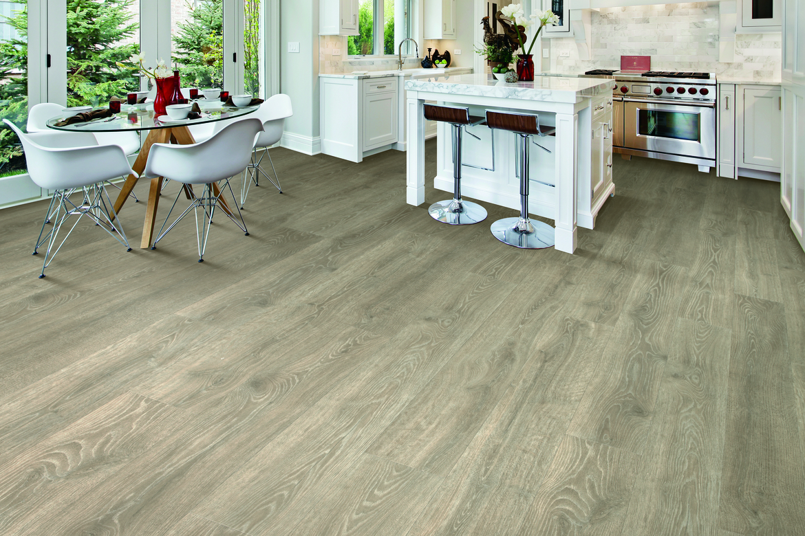 wood look laminate flooring in a kitchen and dining room