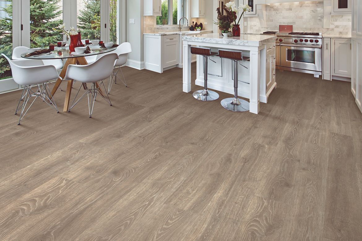 wood look laminate flooring in a kitchen and dining room